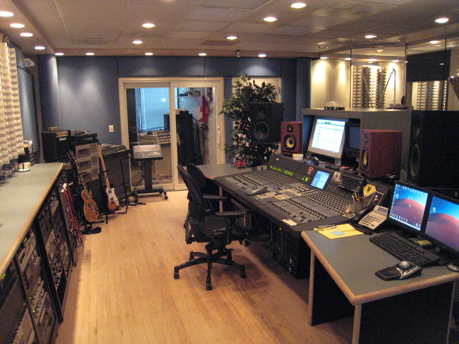 Intermediapost's recording studio is a unique mixture of acoustic tiles and floor to ceiling glass walls allowing you a one of a kind recording experience. From Neumann and Telephunkin microphones to a blend of Protools hardware and Euphonix digital/analog desk we strive to maintain a level of recording quality that is unmatched.