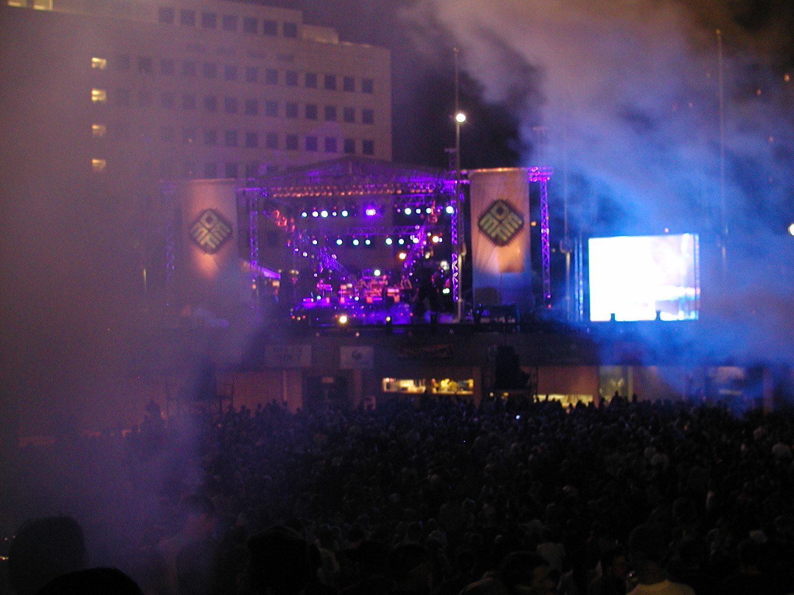 The main stage of Detroit Electronic Music Festival 2002. Taken from the amphitheater rim, shows some of the crowd